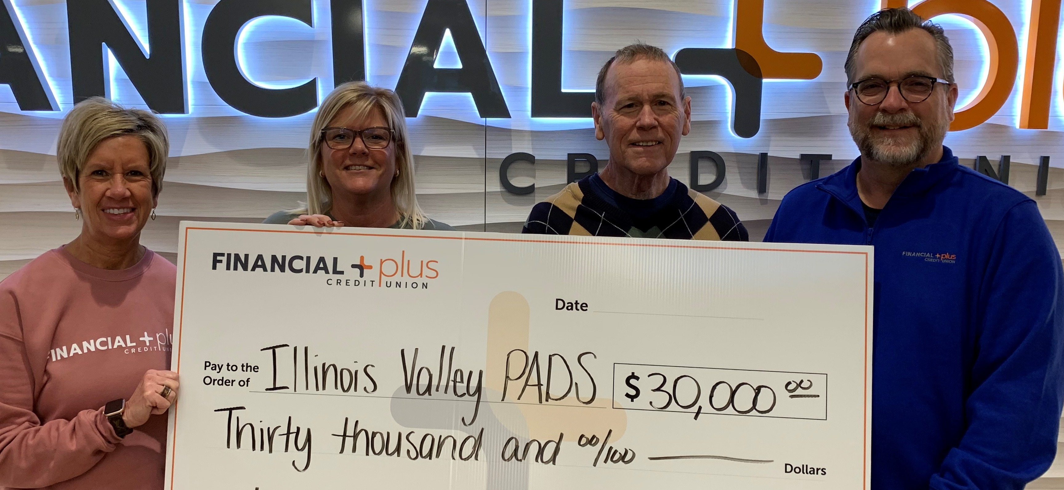 IV PADS donation giant check